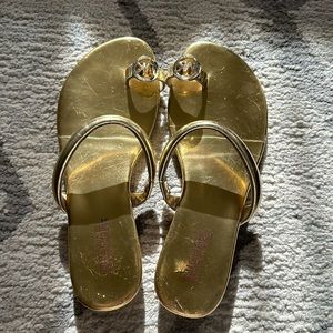 Used gold Michael Kors Nora Toe Thong sandal